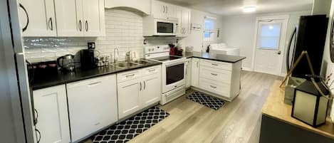 Kitchen includes an RO drinking water system,  also connected to icemaker.