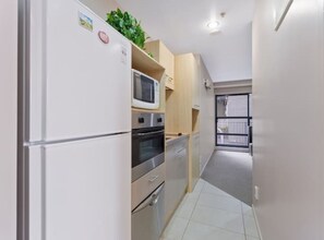 Apartment | Private kitchen - Uptown Two Bedroom Apartment With The Essentials (Auckland)