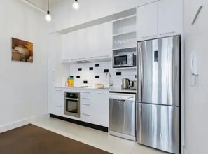 Apartment | Private kitchen - Stylish studio near Spark Arena I Zodiak Stays (Auckland)