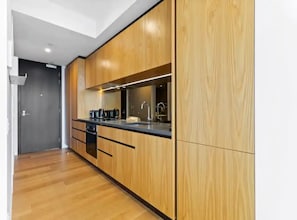 Apartment | Private kitchen | Fridge, microwave, stovetop, cookware/dishes/utensils