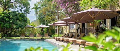 2 outdoor pools, open 7:00 AM to 7:00 PM, pool umbrellas, pool loungers