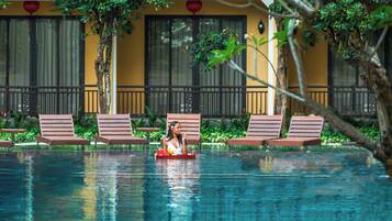 2 outdoor pools, open 7:00 AM to 7:00 PM, pool umbrellas, sun loungers