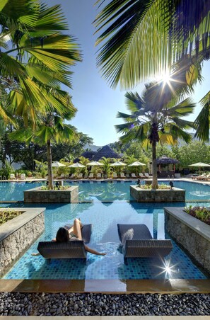 Outdoor pool, free pool cabanas, pool umbrellas - STORY Seychelles (Mahé Island)