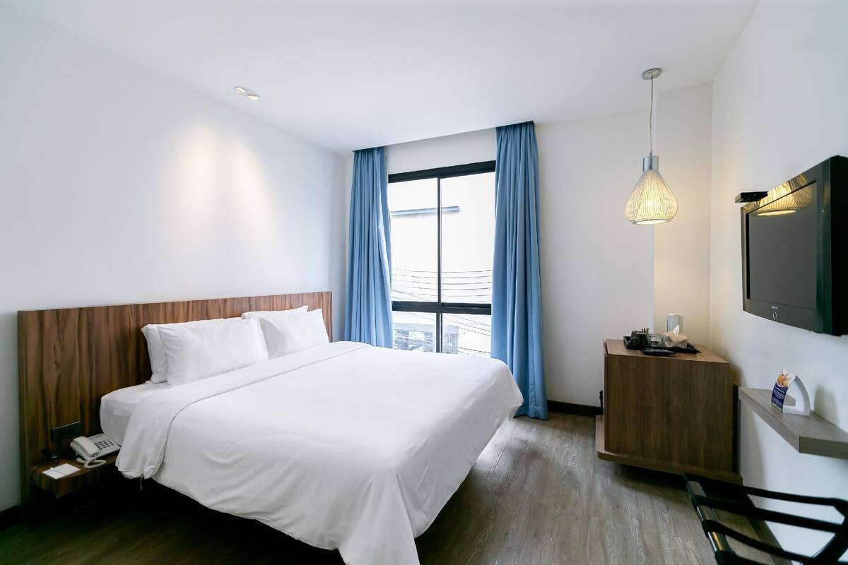Premium bedding, down duvets, Select Comfort beds, minibar