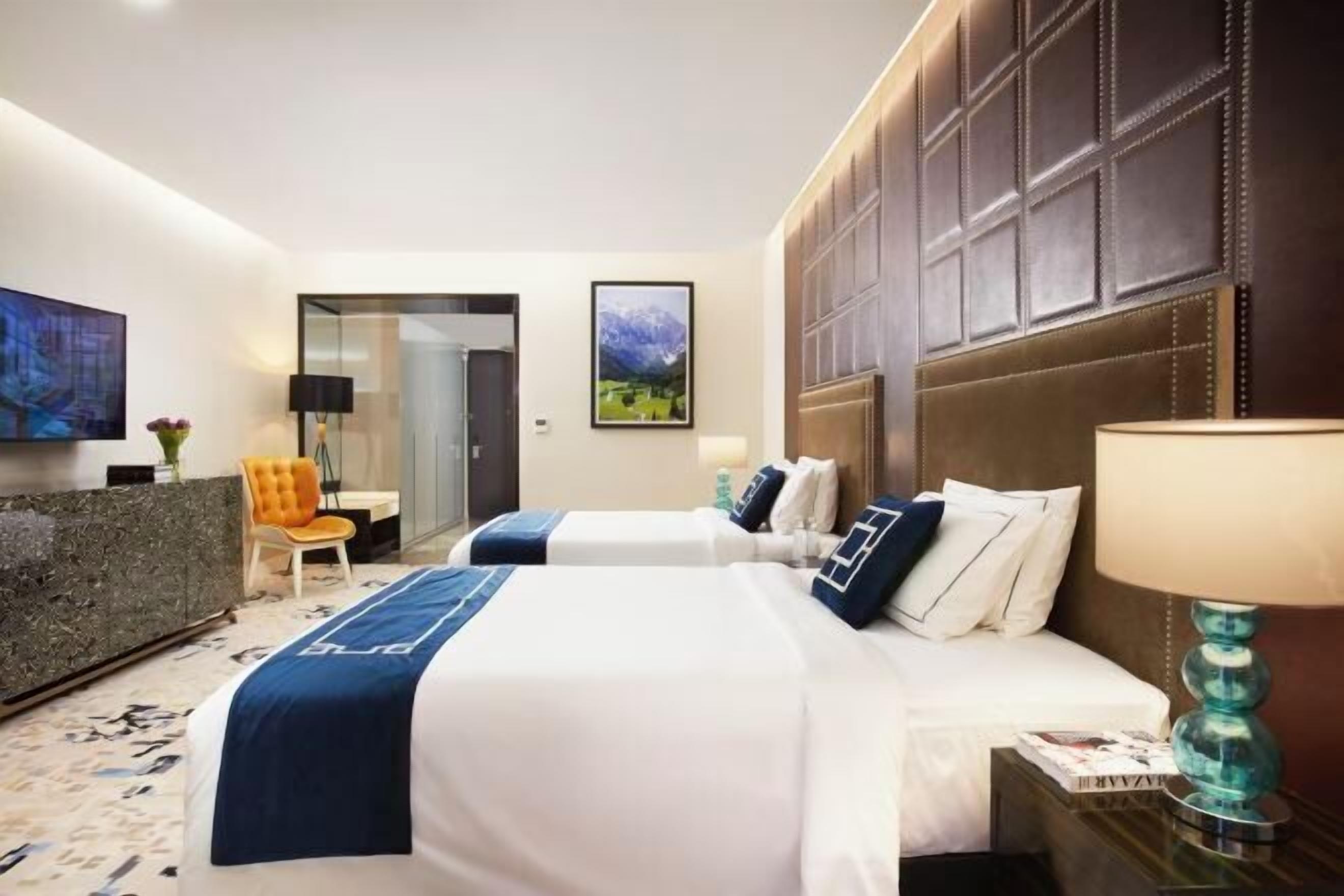 Premium bedding, down duvets, in-room safe, desk