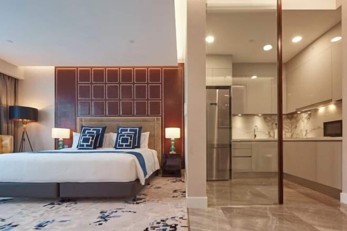 Premium bedding, down comforters, in-room safe, desk