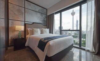 Premium bedding, down duvets, in-room safe, desk