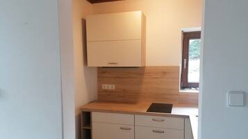 Geladeira, cooktop, lava-louças, cafeteira/chaleira