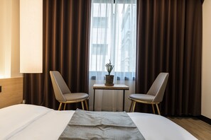 Standaard tweepersoonskamer | Een kluis op de kamer, verduisterende gordijnen, gratis wifi, beddengoed