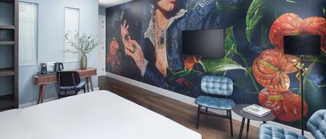 Deluxe Room | Down comforters, in-room safe, individually decorated