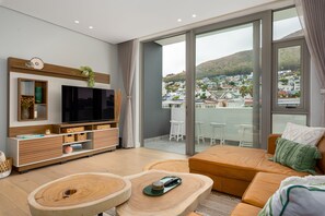 Departamento exclusivo | Área de sala de estar | Televisión de pantalla plana, Netflix y servicios de streaming
