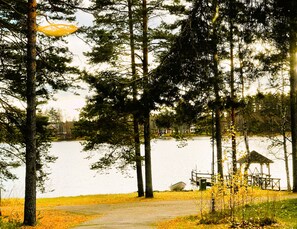 A lakeside path with a gazebo and a small dock by the water. - Herttua Hotel and Spa (Savonlinna)
