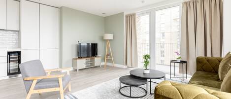 Apartment | Living area | 37-inch TV with cable channels, Netflix, streaming services