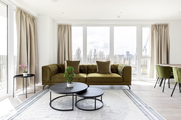 Apartment | Living area | 37-inch TV with cable channels, Netflix, streaming services - The Wembley Apartment (Wembley)