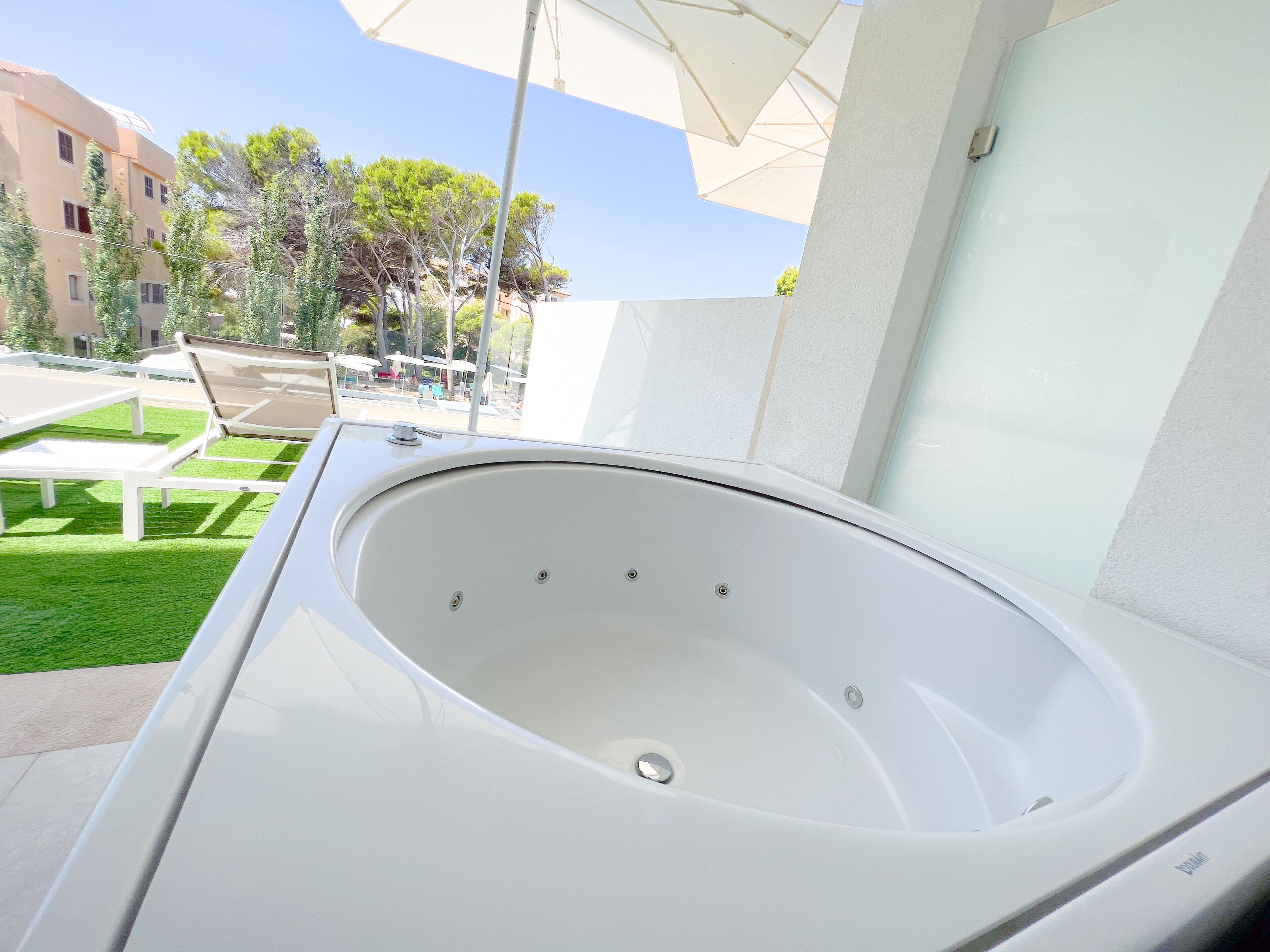 Junior Suite, Terrace, Pool View | Minibar, desk, laptop workspace, blackout drapes