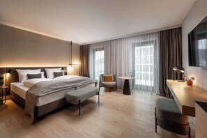 Habitación Deluxe | Ropa de cama hipoalergénica y caja de seguridad en la habitación 