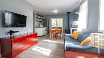 Standard Cottage, Fireplace, Lake View | Living area | 40-inch Smart TV with digital channels, TV, DVD player