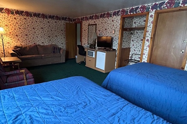 Individually furnished, desk, laptop workspace, iron/ironing board
