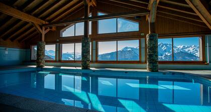 Dans chalet MGM standing avec piscine chauffée prÚs du télécabine et des pistes