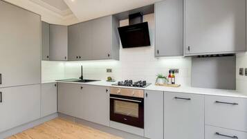 Apartment | Private kitchen | Fridge, microwave, oven, stovetop