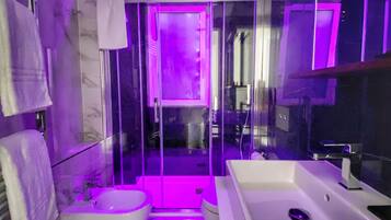 Junior Studio Suite, 2 Bedrooms, Non Smoking, Sea View | Bathroom | Shower, free toiletries, soap, shampoo