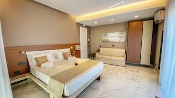 Junior Studio Suite, 2 Bedrooms, Non Smoking, Sea View | Memory foam beds, in-room safe, individually furnished, soundproofing