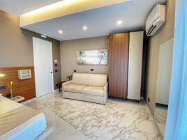 Junior Studio Suite, 2 Bedrooms, Non Smoking, Sea View | Memory foam beds, in-room safe, individually furnished, soundproofing