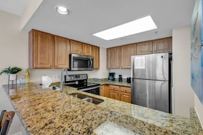 Fridge, microwave, oven, stovetop - Beachfront Condo in Atlantica Resort with Pool (Myrtle Beach)