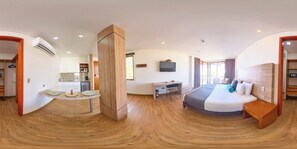 Deluxe studio suite | Een minibar, een kluis op de kamer, individueel gedecoreerd, een bureau