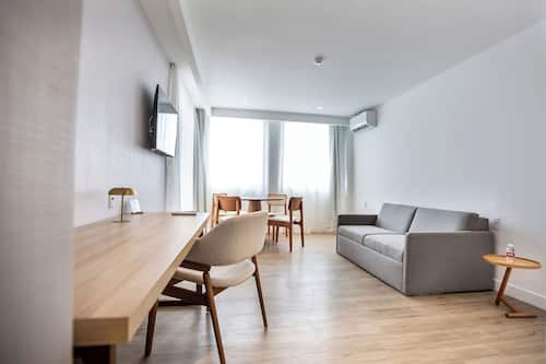 Suite Deluxe | Minibar, coffres-forts dans les chambres