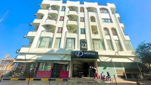 A multi-story hotel with a central entrance and balconies on each floor. - Diana Hotel  (Hurghada)
