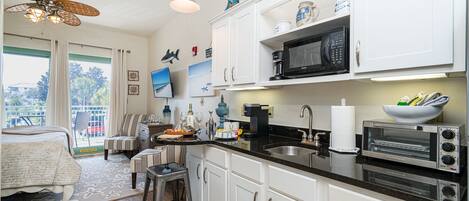 Fridge, microwave, coffee/tea maker, toaster