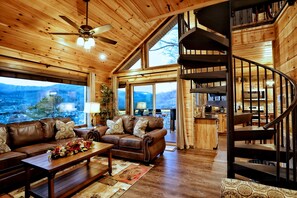 Televisión de pantalla plana, chimenea y futbolito