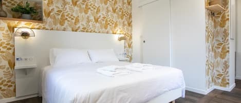 1 dormitorio, tabla de planchar con plancha, wifi gratis y ropa de cama