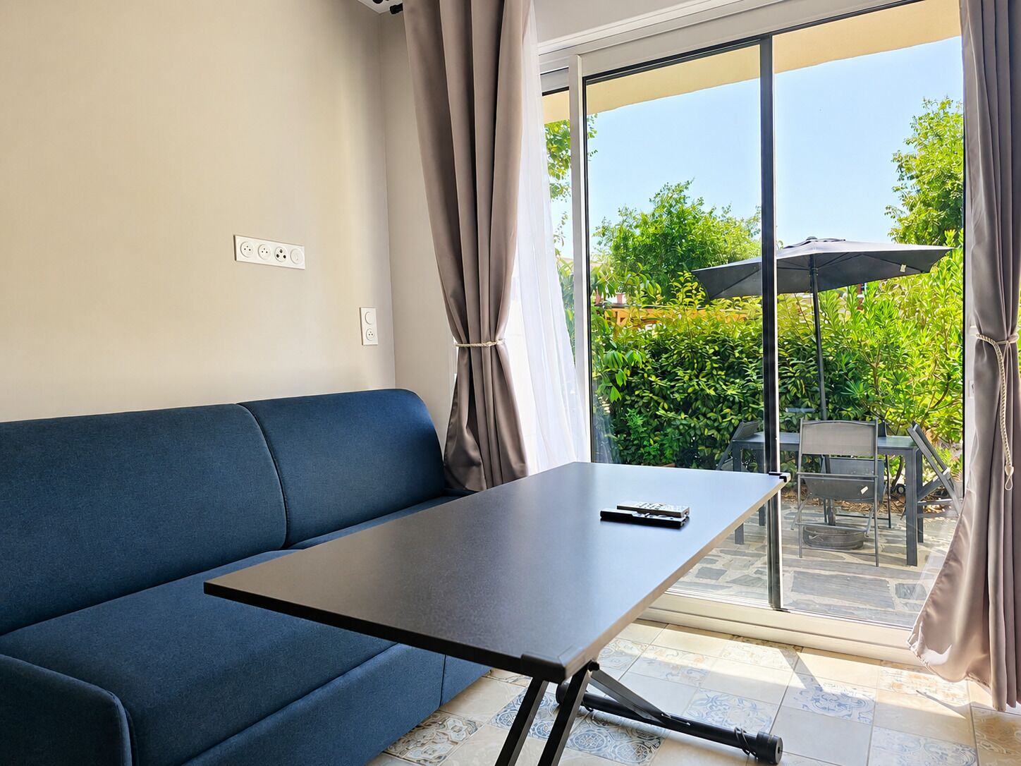 Family Studio, Garden View | Living area | 52-inch Smart TV with satellite channels, Netflix, streaming services