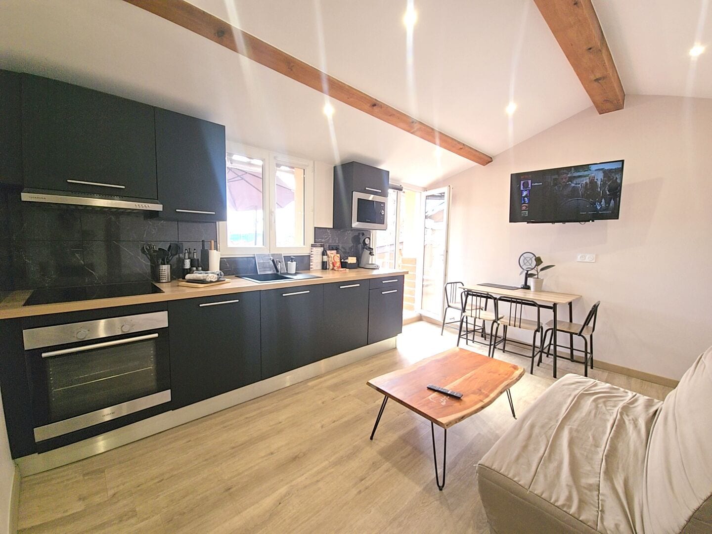 Apartment with cinema and terrace | Private kitchen | Espresso maker, coffee/tea maker, electric kettle, highchair