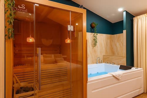 chambre avec jacuzzi et sauna | Baignoire à jets