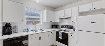 Cheerful 3-bedroom with fenced backyard.