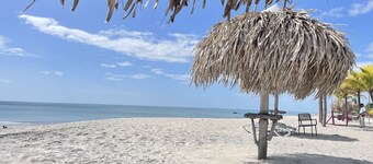 Apartment in Playa Blanca, in front of the sea.  Swimming Pool and Direct Access to the Beach