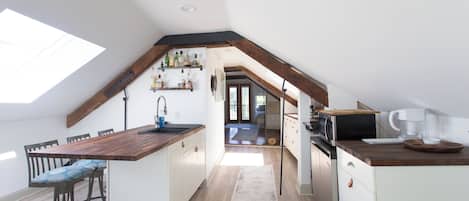 Microwave, coffee/tea maker, toaster, cookware/dishes/utensils