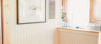 1- Cheerful and cozy water-view cottage
