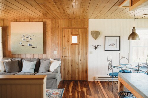 1- Cheerful and cozy water-view cottage