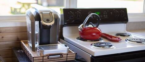 Coffee/tea maker, fridge, microwave, oven