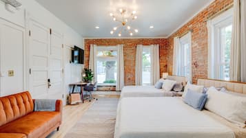 1 bedroom, desk, iron/ironing board, travel crib