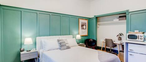 1 bedroom, desk, iron/ironing board, travel cot