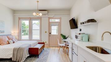 1 bedroom, desk, iron/ironing board, travel cot