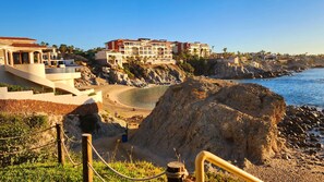 On the beach, sun-loungers, beach towels