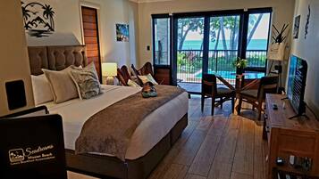 Beach View Suite: King Bed | Premium bedding, in-room safe, laptop workspace, blackout curtains