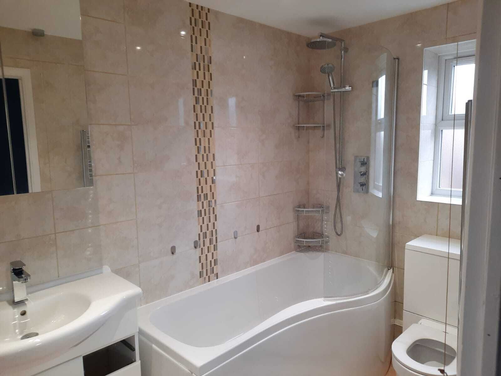 Combined shower/bathtub, towels, soap, toilet paper