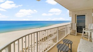 A balcony with a view of the beach and ocean. - Hook Wine & Sinker - Beachfront Condo, 6th Floor (Panama City Beach)
